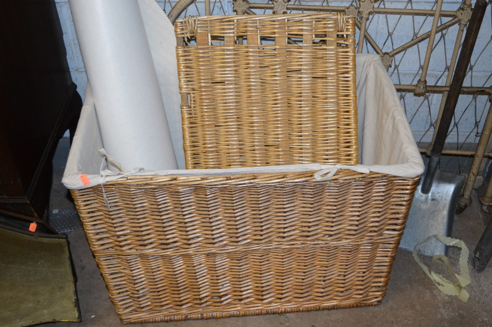 A WICKER LINEN HAMPER