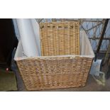 A WICKER LINEN HAMPER