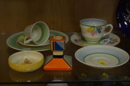 CLARICE CLIFF FOR NEWPORT POTTERY AND WILKINSON LTD, to include 'Crocus' cup (hairline), side plate,