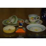 CLARICE CLIFF FOR NEWPORT POTTERY AND WILKINSON LTD, to include 'Crocus' cup (hairline), side plate,