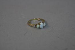 A LATE, 20TH CENTURY OPAL AND DIAMOND RING, ring size approximately K, sizing shots inserted to