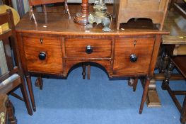 A VICTORIAN MAHOGANY BOWFRONT SIDEBOARD, with three various drawers, approximate size width 107cm