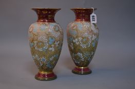 A PAIR OF DOULTON LAMBETH SLATER STONEWARE VASES, with impressed backstamps and 1029 and painted