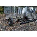 AN OPEN TRAILER FRAME, 9ft long x 5ft wide with leaf suspension and towing hitch