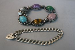 A SILVER CABOCHON SEMI PRECIOUS STONE BRACELET, with a silver locket and chain