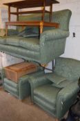 A GREEN UPHOLSTERED THREE PIECE SUITE
