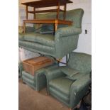 A GREEN UPHOLSTERED THREE PIECE SUITE