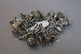 A SILVER CHARM BRACELET, approximate weight 152 grams