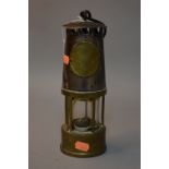 A BRASS MINERS LAMP