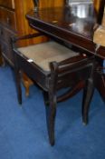 A MAHOGANY FRAMED PIANO STOOL