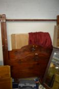 A STAINED PINE 5' FOUR POSTER BED FRAME, with a box of curtains and valances to fit