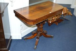 AN EARLY VICTORIAN ROSEWOOD AND MAHOGANY FOLD OVER TEA TABLE, of rectangular form, beaded frieze,