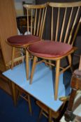 A 1950'S STYLE BEECH AND FORMICA TABLE, with four chairs (5)