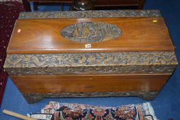 A CARVED CAMPHOR BLANKET CHEST, width 94cm x depth 45cm x height 52cm and a barometer (2)