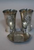 A PAIR OF ELIZABETH II AND PRINCE PHILIP SILVER WEDDING COMMEMORATIVE BEAKERS, of conical form, both