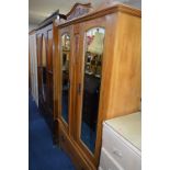 A SATINWOOD DOUBLE DOOR WARDROBE and an Edwardian inlaid single door wardrobe (2)