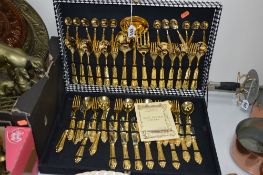 AN ITALIAN GOLD PLATED CANTEEN OF CUTLERY, in a fitted fabric case