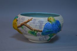 A CLARICE CLIFF FOR NEWPORT POTTERY BOWL, decorated with Budgerigars, approximate diameter 21cm