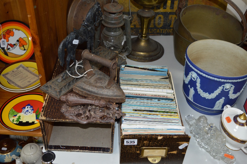A SMALL COLLECTION POSTCARDS, topography etc, a cast door stop, an iron and a door knocker