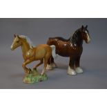 A BESWICK GALLOPING HORSE, No.1374 PALOMINO, (chip to ear), together with Shire Mare No.818,