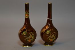 A PAIR OF CARLTON WARE BUD VASES, Rouge Royale with Peacock design