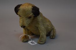 A WHITE PLUSH TERRIER SOFT TOY, horizontal stitched nose, glass eyes, black ears, jointed head,