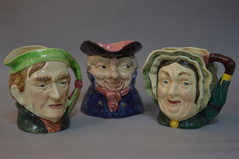 THREE LARGE CHARACTER JUGS, to include Shorter 'The Coachman' and Beswick Sairey Gamp No.371 and