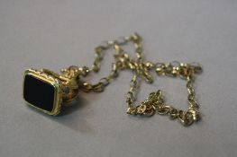 A 9CT FOB AND CHAIN, approximate weight 19.0 grams