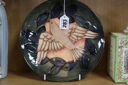 A MOORCROFT POTTERY LIMITED EDITION YEAR PLATE 1993, No 13/500, impressed and painted marks to base,
