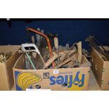 TWO BOXES OF TOOLS, including large auger bits, branding irons, saws, etc