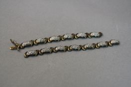 A 9CT DIAMOND BRACELET, approximate weight 10.6 grams, (sd)