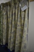 TWO CREAM AND BLUE CURTAINS, with Victorian style scenes, approximate size width 66cm x height