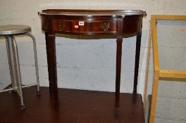 A MODERN HALF MOON MAHOGANY SIDE TABLE