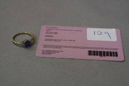 A TANZANITE, (1.00ct) and diamond 9k ring, ring size R, approximate weight 2.5 grams (certificate)