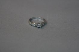 A 9CT DIAMOND SET RING IN WHITE GOLD, ring size K, approximate weight 2.9 grams