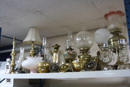 A QUANTITY OF OIL LAMPS, SHADES, PARTS, ETC, to include pair brass lamps