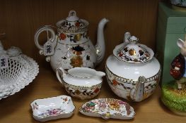 ROYAL CROWN DERBY, to include 'Asian Rose' (seconds), coffee pot, teapot and milk jug, 'Olde