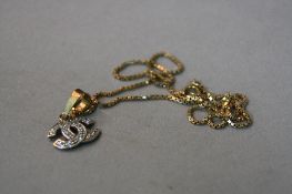 A 9CT GOLD CHANEL PENDANT AND CHAIN, approximate weight 5.3 grams