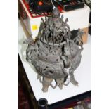 A LARGE CAST ORIENTAL INCENSE HOLDER, decorated with Dragons, birds of paradise, monkeys etc, height