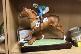 A DISTRESSED LIMITED EDITION ROYAL WORCESTER FIGURE GROUP, 'The Minstrel' with Lester Piggott, by