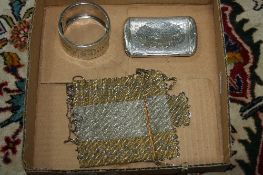 A VICTORIAN SILVER BANGLE, a Victorian silver snuff box (sd) and a mesh evening bag (3)