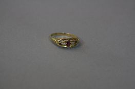 AN EDWARDIAN 18CT RUBY AND DIAMOND GYPSY RING, ring size M, approximate weight 2.3 grams