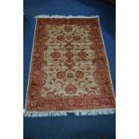 ZIEGLER STYLE GROUND RUG, red, beige and gold ground, approximate size 190cm x 136cm