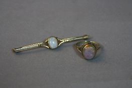 A 9CT OPAL RING, ring size H and a 9ct opal bar brooch (2)