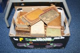 A BOX OF 18TH CENTURY LEATHER BOUND BOOKS ETC
