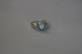A 9CT AQUAMARINE AND DIAMOND RING, ring size L, approximate weight 3.4 grams