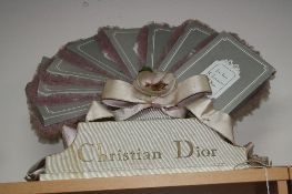 A CHRISTIAN DIOR SHOP DISPLAY ADVERTISING STAND, 'Les Bas Christian Dior', with fabric bow, height