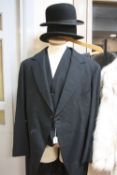 A GENT'S MORNING SUIT, to include trousers, tails and waistcoat, together with two bowler hats,