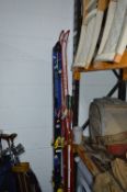 A PAIR OF ROSSIGNOL AND FISCHER SKIS, and a pair of poles (6)