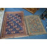 AN EARLY 20TH CENTURY CAUCASION WOOLLEN RUG, red and blue ground, multi strap border, floral